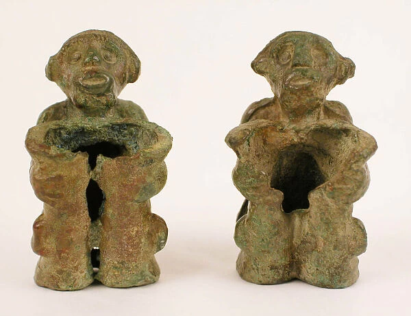 Pair of slide fittings in the form of monkeys, Late Shang dynasty or early Western Zhou