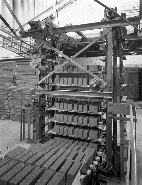 Palletising machine at Whitwick Brickworks, Coalville, Leicestershire, 1963. Artist