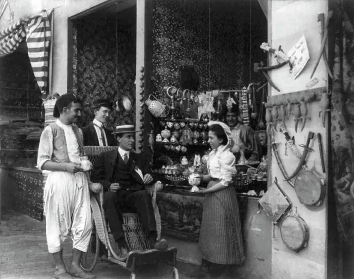 Framed Print : Pan-American Exposition, Buffalo, N.Y. 1901: Man in wheeled chair at souvenir shop with 4... 1901. Creator: Frances Benjamin Johnston Framed Print : Pan-American Exposition, Buffalo, N.Y. 1901: Man in wheeled chair at souvenir shop with 4... 1901. Creator: Frances Benjamin Johnston