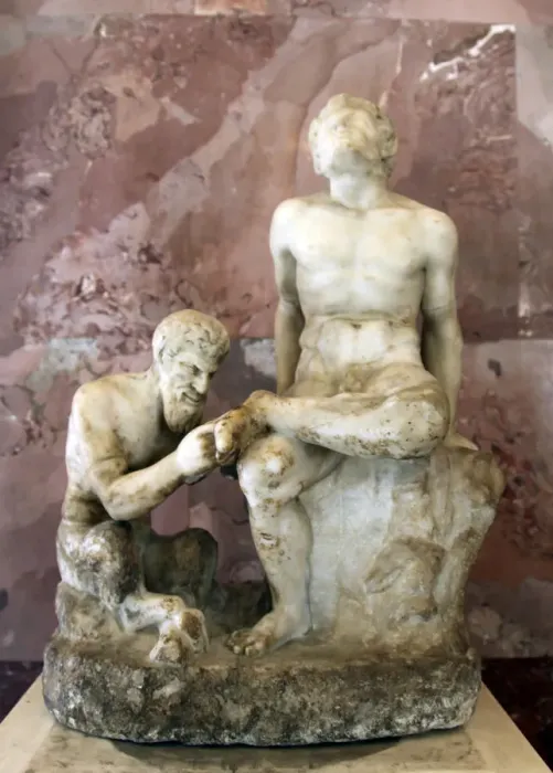 Framed Print : Pan and satyr, Pan removing a splinter from a satyrs foot Framed Print : Pan and satyr, Pan removing a splinter from a satyrs foot