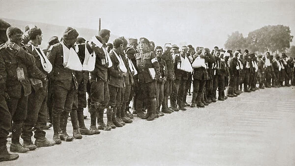 A parade of the walking wounded, Somme campaign, France, World War I, 1916. Artist