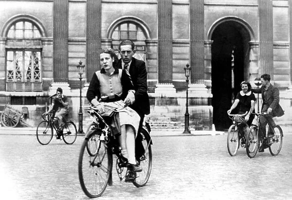 Parisians travelling by bicycle, German-occupied Paris, July 1940