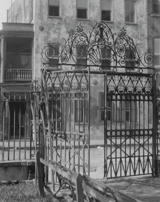 Framed Print : Park gate and houses, [36 Chalmers Street through Washington Park Gate], Charleston... c1920-c1926. Creator: Arnold Genthe