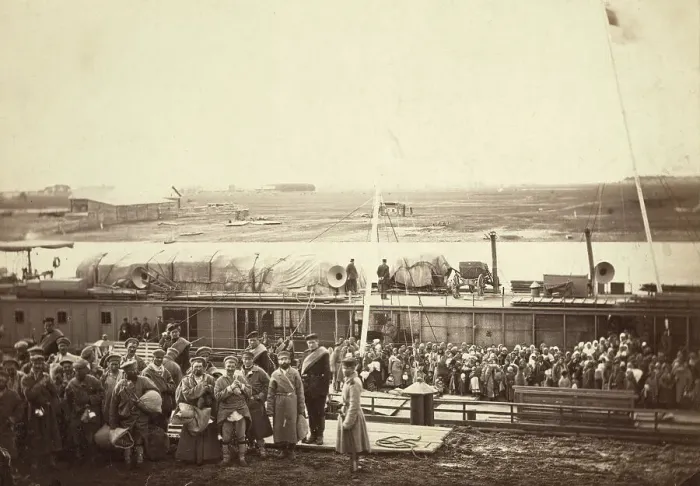 Framed Print : Party of exiles and convicts embarking on river barge at Tumen [ie, Tiumen]... between 1885 and 86. Creator: Unknown