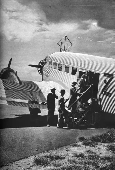 Framed Print : Passengers boarding one of the Junkers airliners of South African Airways, c1936 (c1937) Framed Print : Passengers boarding one of the Junkers airliners of South African Airways, c1936 (c1937)