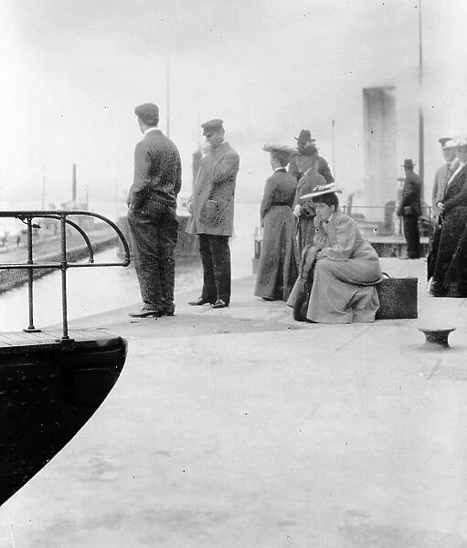 Passengers waiting to board a freighter at the locks at Sault Sainte Marie, Michigan, 1903. Creator: Frances Benjamin Johnston