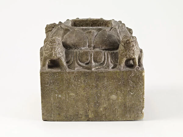 Pedestal with lotus petals, lions, and donor, originally supporting