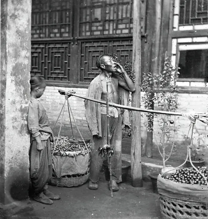 Framed Print : Peking, Pechili province, China: a travelling fruit-seller, 1869. Creator: John Thomson Framed Print : Peking, Pechili province, China: a travelling fruit-seller, 1869. Creator: John Thomson