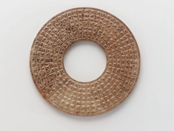 Pendant in the form of a disk (bi) with raised knobs, Eastern Zhou dynasty, 475-221 BCE