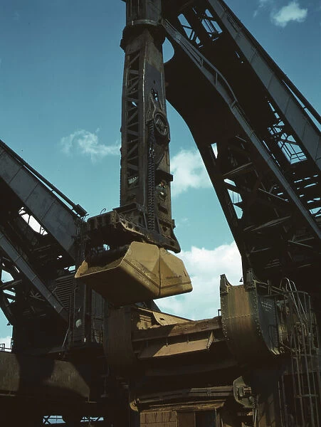 Pennsylvania R. R. ore docks, a 'Hulett'ore unloader in operation, Cleveland, Ohio, 1943. Creator: Jack Delano