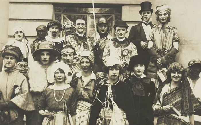Framed Print : People gathered outside a building wearing various costumes, some in drag, 1924. Creator: Unknown Framed Print : People gathered outside a building wearing various costumes, some in drag, 1924. Creator: Unknown