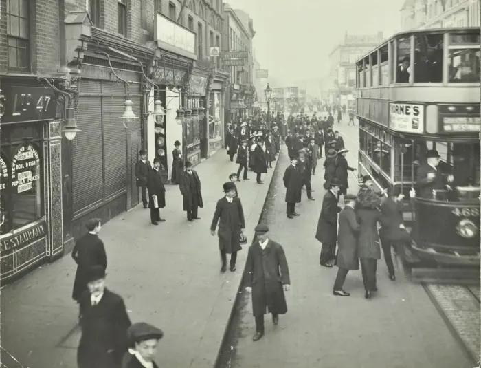Framed Print : People rushing to get on a trolley bus at 7. 05 am, Tooting Broadway, London, April 1912