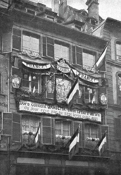 Petain et Foch a Strasbourg; La parure de fete de Strasbourg liberee: deux facades ornee...1918. Creator: Unknown