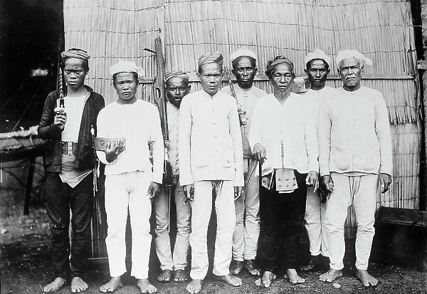 Philippines - Moro Datu And His Followers, 1913. Creator: Harris & Ewing. Philippines - Moro Datu And His Followers, 1913. Creator: Harris & Ewing