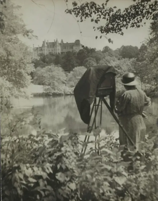 Framed Print : Photographer Frances Benjamin Johnston standing beside her large view camera looking... c1938. Creator: Unknown Framed Print : Photographer Frances Benjamin Johnston standing beside her large view camera looking... c1938. Creator: Unknown