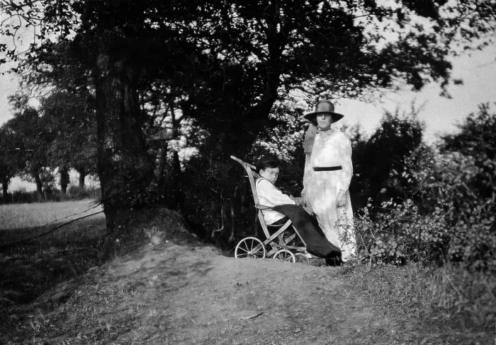 Framed Print : A physically disabled boy sitting in a wheelchair, c1910 / 1925. Creator: Unknown Framed Print : A physically disabled boy sitting in a wheelchair, c1910 / 1925. Creator: Unknown