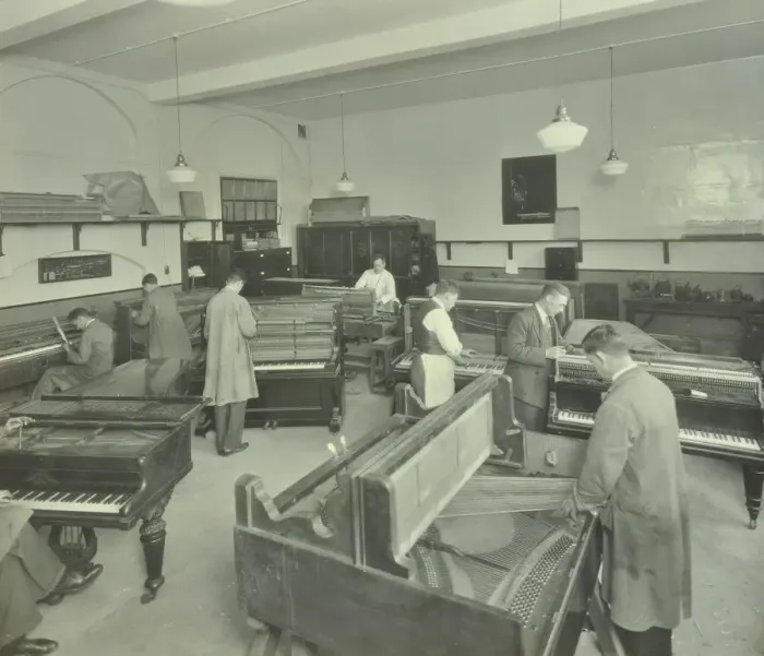 Framed Print : Piano repairing class, Northern Polytechnic, London, 1930 Framed Print : Piano repairing class, Northern Polytechnic, London, 1930