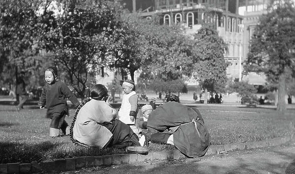 A picnic on Portsmouth Square, Chinatown, San Francisco, between 1896 and 1906. Creator: Arnold Genthe