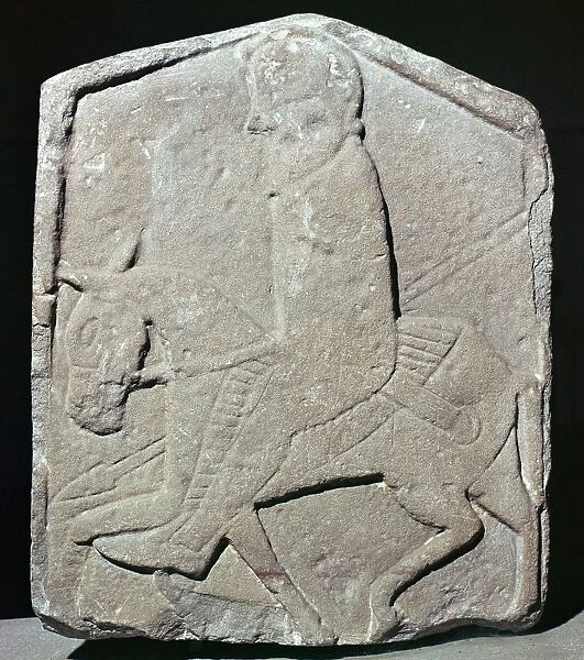 Detail of a Pictish slab showing a horseman with sword and spear, 7th century