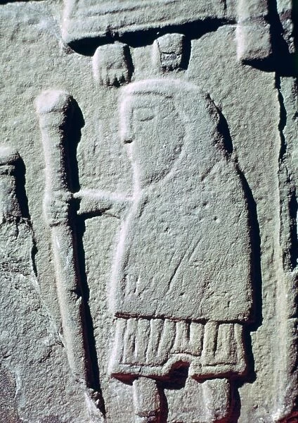 Detail of a Pictish Stone with a man wearing trousers, 11th century