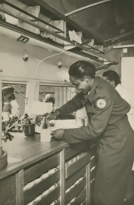 Framed Print : Picture postcard of a volunteer serving troops out of a Red Cross Clubmobile Framed Print : Picture postcard of a volunteer serving troops out of a Red Cross Clubmobile