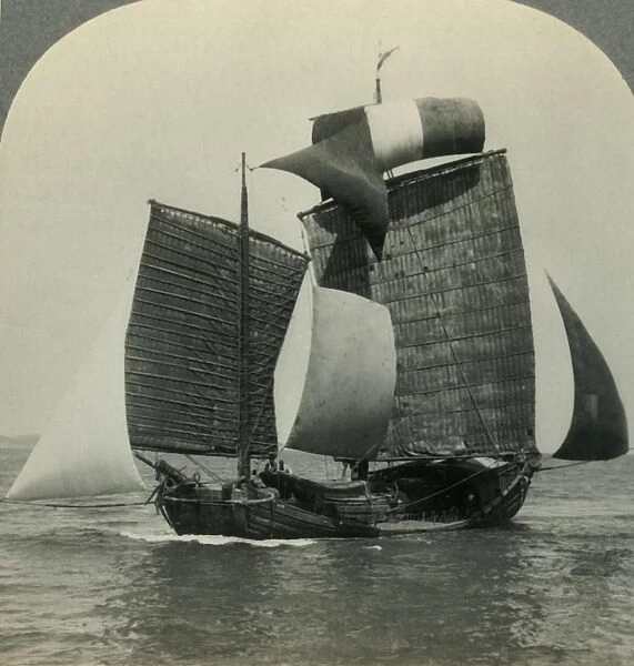 Picturesque Chinese Junk under Full Sail on the Yellow Sea, Coast of Manchukuo in Distance