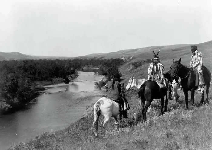 Framed Print : Three Piegan Indians and four horses on hill above river, c1910. Creator: Edward Sheriff Curtis Framed Print : Three Piegan Indians and four horses on hill above river, c1910. Creator: Edward Sheriff Curtis
