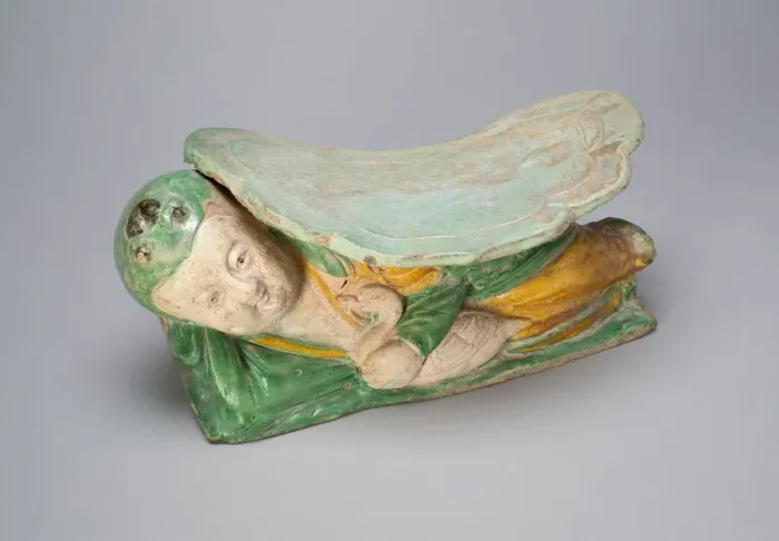 Framed Print : Pillow with Boy Supporting a Cloud-Shaped Headrest, Jin dynasty (1115-1234) Framed Print : Pillow with Boy Supporting a Cloud-Shaped Headrest, Jin dynasty (1115-1234)