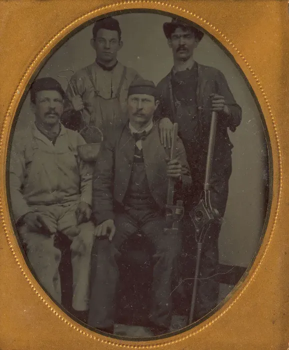 Framed Print : Four Pipe Fitters with Tools, late 1850s-70s. Creator: Unknown Framed Print : Four Pipe Fitters with Tools, late 1850s-70s. Creator: Unknown