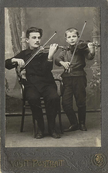 P.L. Stolyarov and V.P. Karetnikov playing violins, 1910-1919. Creator: I. F. Varlekhovskii