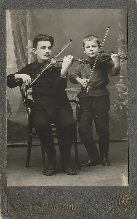Framed Print : P.L. Stolyarov and V.P. Karetnikov playing violins, 1910-1919. Creator: I. F. Varlekhovskii Framed Print : P.L. Stolyarov and V.P. Karetnikov playing violins, 1910-1919. Creator: I. F. Varlekhovskii