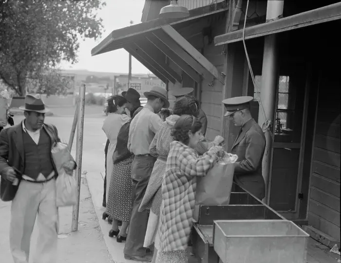 Framed Print : Plant quarantine inspectors examining packages brought over the bridge... Texas, 1937. Creator: Dorothea Lange Framed Print : Plant quarantine inspectors examining packages brought over the bridge... Texas, 1937. Creator: Dorothea Lange