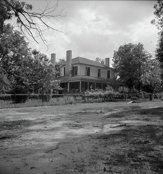 Plantation house where the Wray family has lived for generations, Greene County, Georgia, 1937. Creator: Dorothea Lange