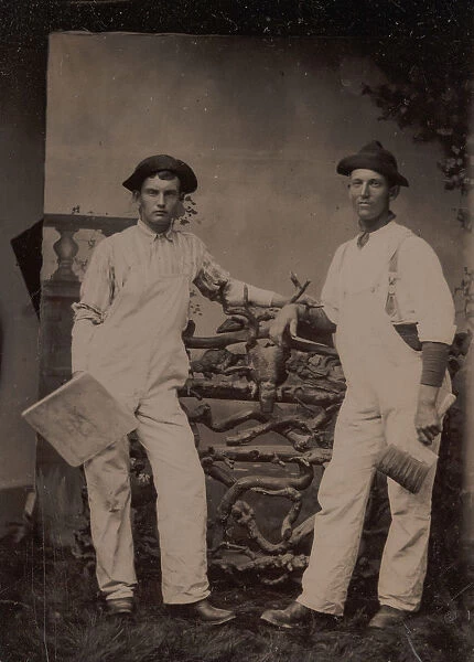 Two Plasterers in Overalls Leaning on a Rustic Fence, 1870s-80s. Creator: Unknown