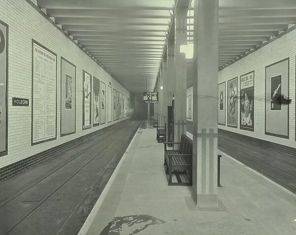 Platform with advertising posters, Holborn Underground Tram Station, London, 1931