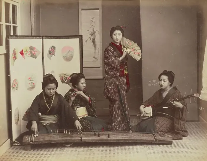 Framed Print : Playing with Music, 1870s-1890s. Creator: Kusakabe Kimbei Framed Print : Playing with Music, 1870s-1890s. Creator: Kusakabe Kimbei