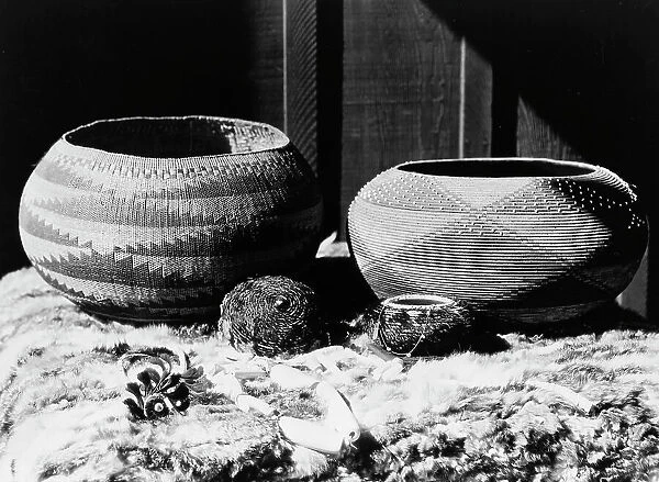 Pomo baskets and magnesite beads, 1924, c1924. Creator: Edward Sheriff Curtis