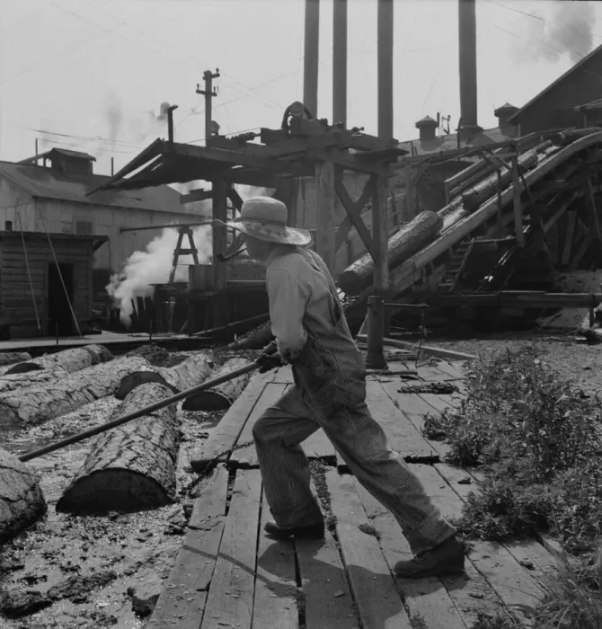 Framed Print : Pond monkey guides... Pelican Bay Lumber Company mill, Klamath Falls, Oregon, 1939. Creator: Dorothea Lange Framed Print : Pond monkey guides... Pelican Bay Lumber Company mill, Klamath Falls, Oregon, 1939. Creator: Dorothea Lange