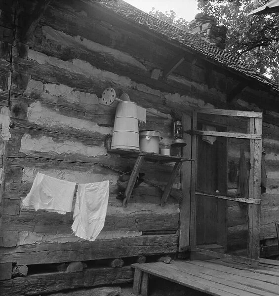Porch on Negro share tenant cabin, near Gordonton, North Carolina, 1939. Creator: Dorothea Lange