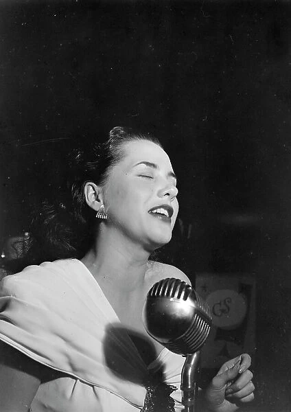 Portrait of Ann Hathaway, Café Society (Downtown), New York, N.Y. 1946. Creator: William Paul Gottlieb