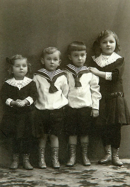 Portrait of four children, 1910s. Artist: Georgi Vasilievich Trunov