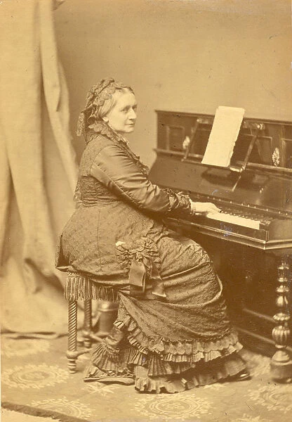 Portrait of Clara Wieck-Schumann (1819-1896) at the piano, ca 1878. Creator: Hanfstaengl