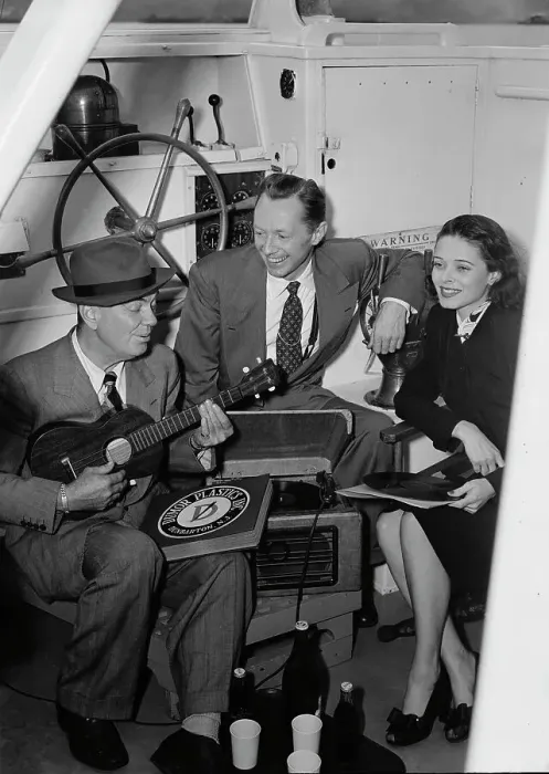 Framed Print : Portrait of Cliff Edwards, Betty Brewer, and Frank... Ukelele Lady (yacht), Hudson River, NY, 1947. Creator: William Paul Gottlieb Framed Print : Portrait of Cliff Edwards, Betty Brewer, and Frank... Ukelele Lady (yacht), Hudson River, NY, 1947. Creator: William Paul Gottlieb