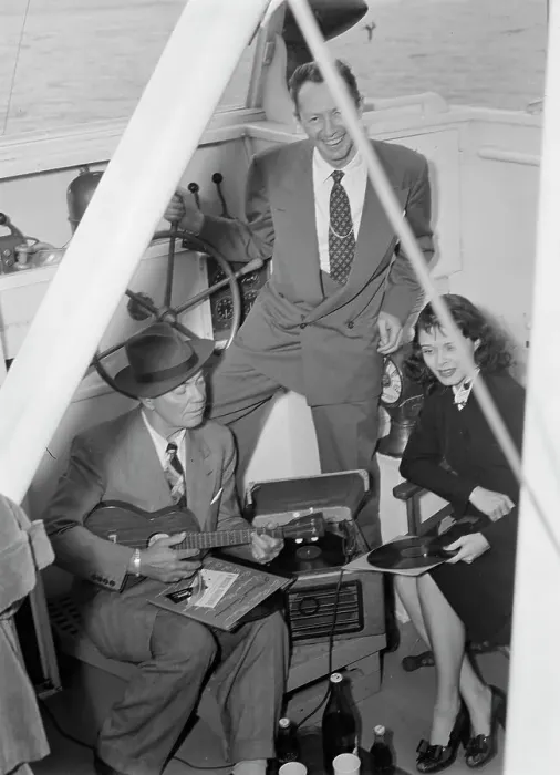 Framed Print : Portrait of Cliff Edwards, Betty Brewer, and Frank...Ukelele Lady (yacht), Hudson River, N.Y. 1947. Creator: William Paul Gottlieb Framed Print : Portrait of Cliff Edwards, Betty Brewer, and Frank...Ukelele Lady (yacht), Hudson River, N.Y. 1947. Creator: William Paul Gottlieb