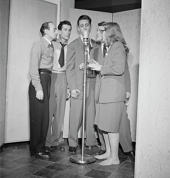 Portrait of Dave Lambert, Jerry Duane, Wayne Howard, Jerry Packer, and Margaret Dale, N.Y. 1947. Creator: William Paul Gottlieb