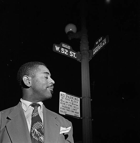 Portrait of Dizzy Gillespie, 52nd Street, New York, N.Y. 1946. Creator: William Paul Gottlieb