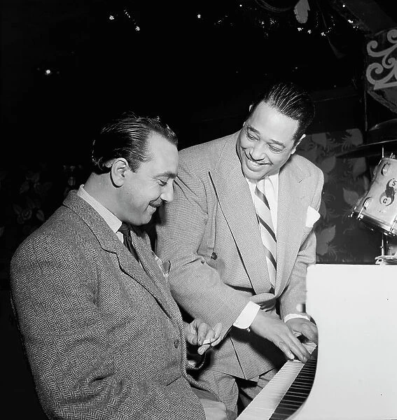 Portrait of Django Reinhardt and Duke Ellington, Aquarium, New York, N.Y. ca. Nov. 1946. Creator: William Paul Gottlieb