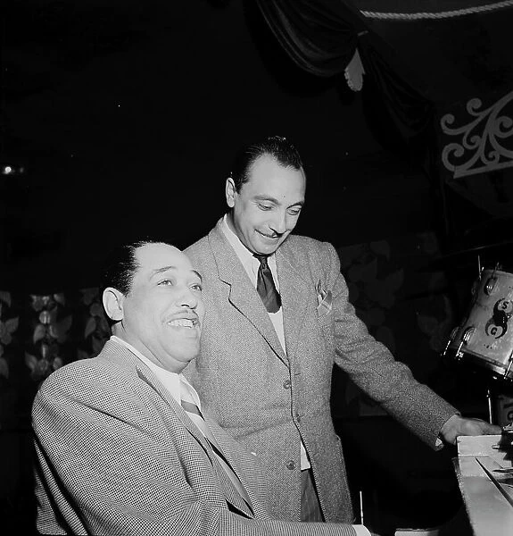 Portrait of Django Reinhardt and Duke Ellington, Aquarium, New York, N.Y. ca. Nov. 1946. Creator: William Paul Gottlieb