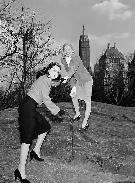 Portrait of Doris Day and Kitty Kallen, Central Park, New York, N.Y. ca. Apr. 1947. Creator: William Paul Gottlieb
