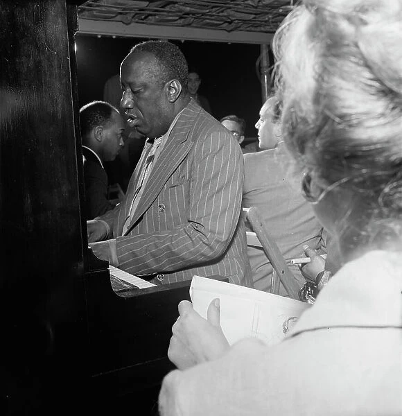 Portrait of James P. (James Price) Johnson, Riverboat on the Hudson, N.Y. ca. July 1947. Creator: William Paul Gottlieb